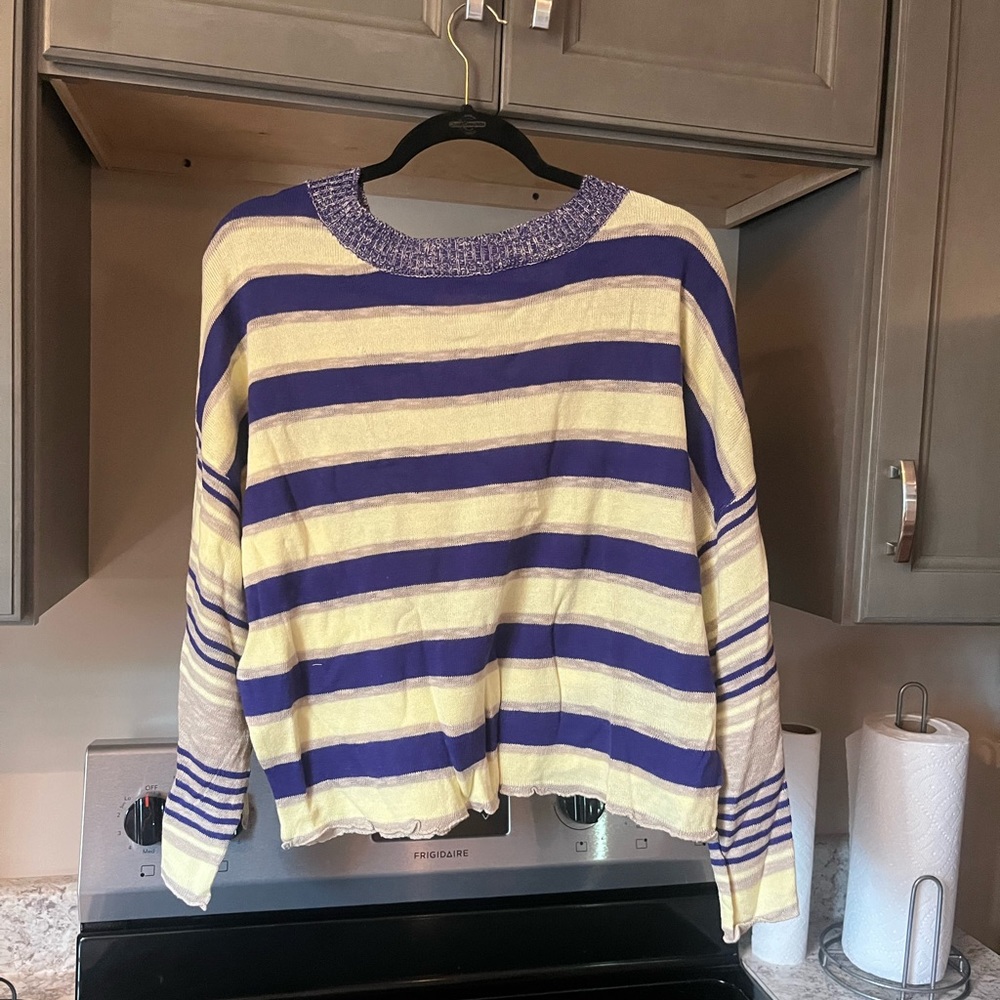 Blue and yellow striped By Together sweater.